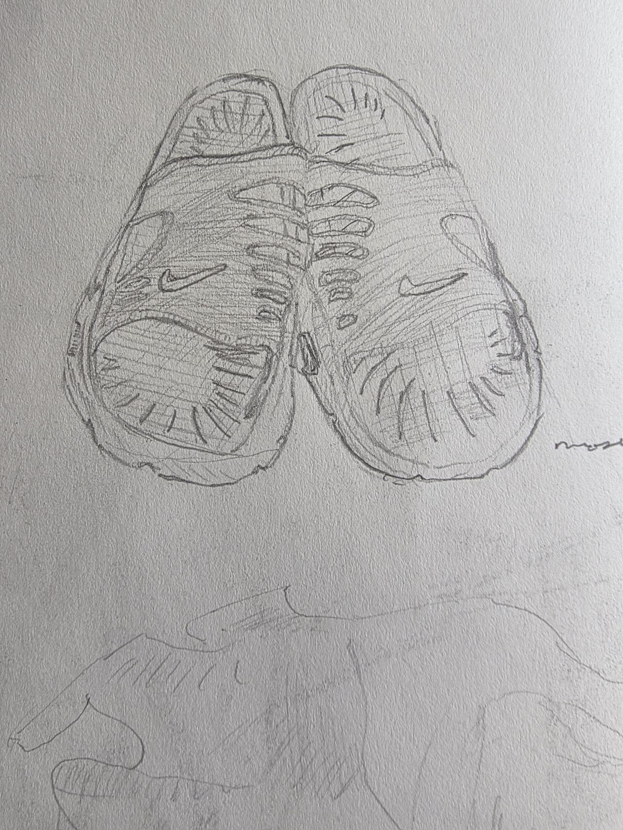 Graphite sketch of a pair of slides / sandals